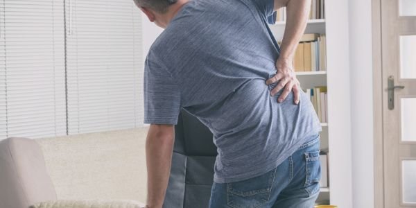 Back Pain from Bending While Working? Know the Cause and Prevention Tips by the Best Doctor for Back Pain in Delhi