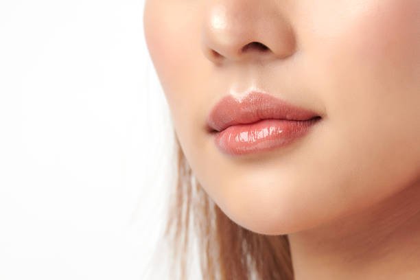How Does Lip Reduction Surgery Improve Your Smile?