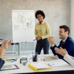 An entrepreneur presents her pitch to a meeting.