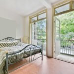 A bedroom with a metal bed frame in the philippines