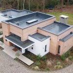 Flat Roof Services for Homes & Commercial Buildings: Repair, Replacement & Construction